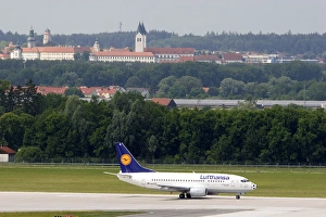 Lufthansa Boeing 737 airplane landing at Munich airport, Germany Lufthansa Boeing 737 airplane landing at Munich airport, Germany