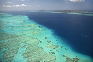 Malolo Barrier Reef and Malolo Island, Mamanuca Islands, Fiji, South Pacific - aerial Malolo Barrier Reef and Malolo Island, Mamanuca Islands, Fiji, South Pacific - aerial
