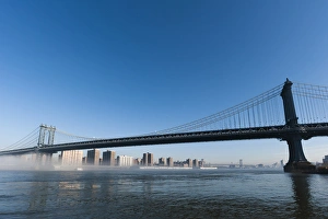 Manhattan bridge in the morning mist, New York City, USA Manhattan bridge in the morning mist, New York City, USA