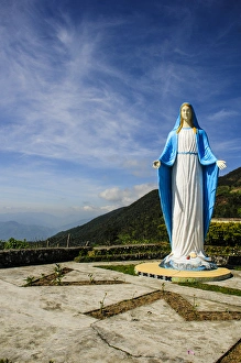 Maria statue on top of a pass, along the rice terraces from Bontoc to Banaue, Luzon Maria statue on top of a pass, along the rice terraces from Bontoc to Banaue, Luzon