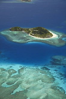 Matamanoa Island and coral reef, Mamanuca Islands, Fiji, South Pacific - aerial Matamanoa Island and coral reef, Mamanuca Islands, Fiji, South Pacific - aerial