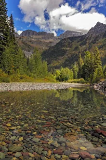 McDonald Creek with Garden Wall in early autumn in Glacier National Park, Montana, USA McDonald Creek with Garden Wall in early autumn in Glacier National Park, Montana, USA