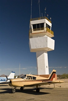 Mexico, Baja California, San Felipe. Control tower and single engine planes at airstip Mexico, Baja California, San Felipe. Control tower and single engine planes at airstip