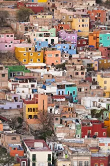 Mexico, Guanajuato. Colorful homes perch on the hillside of this Mexican town