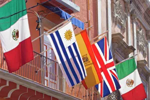 Mexico, Guanajuato. Flags displayed from balcony Mexico, Guanajuato. Flags displayed from balcony