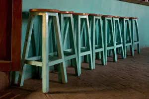 Mexico, Oaxaca, Green Bar Stools line wall inside Roof Top Cafe near the Iglesia de Santo Domingo Mexico, Oaxaca, Green Bar Stools line wall inside Roof Top Cafe near the Iglesia de Santo Domingo