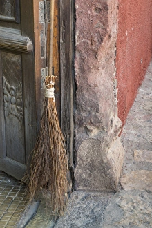 Mexico, San Miguel de Allende. Broom in doorway Mexico, San Miguel de Allende. Broom in doorway