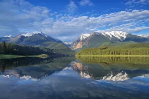 Mission Reservoir reflecting peaks of the Mission Mountains near St Ignatius, Montana
