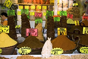 Mole pastes and powders being sold at the Merced Market in Mexico City, Mexico Mole pastes and powders being sold at the Merced Market in Mexico City, Mexico