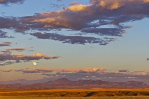 Full moon rises above the Highwood Mountains near Great Falls, Montana, USA Full moon rises above the Highwood Mountains near Great Falls, Montana, USA