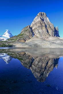 Mount Assiniboine and Sunburst Peak as seen from Sunburst Lake Mount Assiniboine and Sunburst Peak as seen from Sunburst Lake