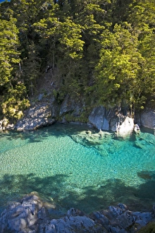 Mt Aspiring National Park, New Zealand. The emerald lakes are a hidden gem that can Mt Aspiring National Park, New Zealand. The emerald lakes are a hidden gem that can