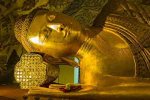 Myanmar. Mandalay. Kusinara pagoda. Reclining buddha Myanmar. Mandalay. Kusinara pagoda. Reclining buddha