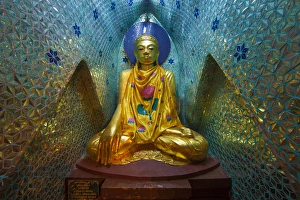 Myanmar, Yangon. Buddha statue in Schwedagon Temple Myanmar, Yangon. Buddha statue in Schwedagon Temple