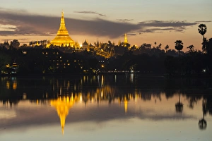 Myanmar, Yangon. Dusk falls on Schwedagon Pagoda Myanmar, Yangon. Dusk falls on Schwedagon Pagoda