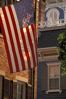 NA, USA, Massachusetts, Nantucket Island, Nantucket Town. Main Street and US flag NA, USA, Massachusetts, Nantucket Island, Nantucket Town. Main Street and US flag