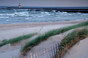 Fence Gallery: NA, USA, Michigan, Berrien County, St. Joseph, St. Joseph lighthouse with beach foreground