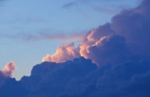 New Gloucester, MESunset colors light the clouds behind a thunderstorm New Gloucester, MESunset colors light the clouds behind a thunderstorm