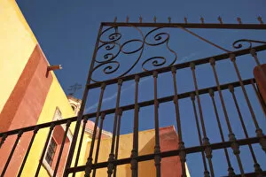 Images Dated 29th October 2010: North America, Mexico, Guanajuato State, Guanajuato, detail of iron gate in fron tof yellow