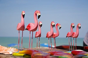 North America, Mexico, Yucatan, Celestun. Wooden pink flamingos displayed in a craft North America, Mexico, Yucatan, Celestun. Wooden pink flamingos displayed in a craft