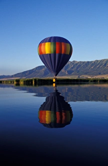North America, USA, Utah, Cache Valley, Logan River Marshes at sunrise. hot air balloon North America, USA, Utah, Cache Valley, Logan River Marshes at sunrise. hot air balloon