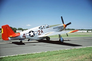 North American P-51C Tuskegee Airmen Red Tail on the runway in Fleming Field North American P-51C Tuskegee Airmen Red Tail on the runway in Fleming Field