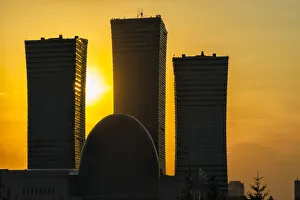 Northern Lights apartment buildings and egg-shaped building of National Archive at sunset Northern Lights apartment buildings and egg-shaped building of National Archive at sunset