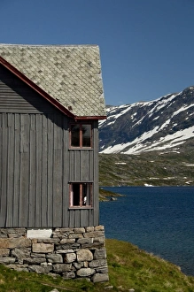 Norway. Scenic byway 63 between Geiranger & Hellesylt. Djupvasshytta Mountain Lodge and lake Norway. Scenic byway 63 between Geiranger & Hellesylt. Djupvasshytta Mountain Lodge and lake