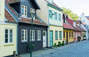 Odense Denmark, beautiful old row homes cobblestone streets in Hans Christian Andersen Odense Denmark, beautiful old row homes cobblestone streets in Hans Christian Andersen