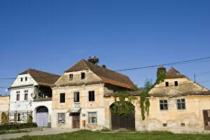 Ciconiiformes Gallery: Old buildings in Prejmer (Tartlau) in Transsilvania with stork nest..Europe, Eastern Europe