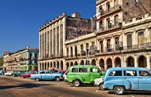 Old Classic American cars in main central street by Capitol in Havana Habana Cuba Old Classic American cars in main central street by Capitol in Havana Habana Cuba