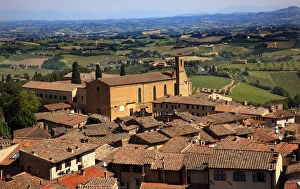 Images Dated 14th May 2009: Old Tuscan Town Church Red Brick Roofs Countryside Vineyards San Gimignano Tuscany Italy