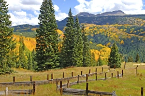 Old wooden fence and autumn colors in the San Juan Mountains of Colorado Old wooden fence and autumn colors in the San Juan Mountains of Colorado