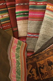 Old woven textile on display in shop, Lima, Peru Old woven textile on display in shop, Lima, Peru