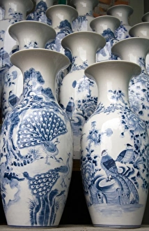 Painted ceramic vases at the Thai Son pottery factory near Ha Long, Vietnam Painted ceramic vases at the Thai Son pottery factory near Ha Long, Vietnam