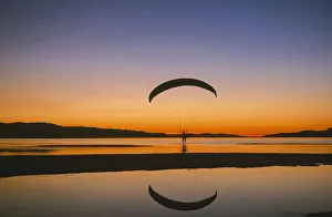 Paraglider over the Great Salt Lake, Utah at sunset. (PR, MR) Paraglider over the Great Salt Lake, Utah at sunset. (PR, MR)