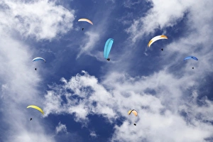 Paragliders near Wanaka, South Island, New Zealand Paragliders near Wanaka, South Island, New Zealand