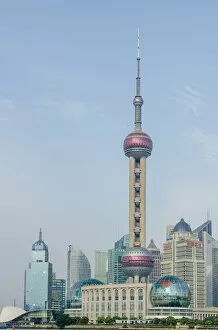Images Dated 26th May 2012: Pearl Tower over Pudong district skyline Shanghai, China