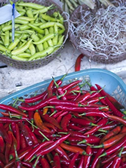 Peppers and other produce in a market in Hoi An, Vietnam Peppers and other produce in a market in Hoi An, Vietnam