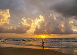 Person walking on beach, South Padre Island Person walking on beach, South Padre Island