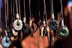 Artifact Gallery: Peru. Hand painted ceramic pendants