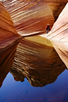 A photographer at the Wave in the Paria Canyon-Vermilion Cliffs wilderness area (MR) A photographer at the Wave in the Paria Canyon-Vermilion Cliffs wilderness area (MR)