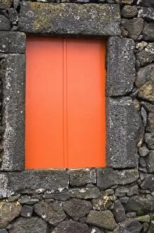 Images Dated 30th April 2005: Pico, Azores, Portugal. Colorful window in stone house