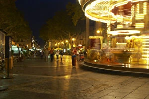 Images Dated 15th October 2005: The place de l Horloge main town square in Avignon at night with a merry-go-round
