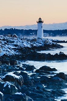 Portsmouth Harbor lighthouse in New Castle, New Hampshire. Dawn. Winter Portsmouth Harbor lighthouse in New Castle, New Hampshire. Dawn. Winter