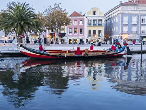 Portugal, Aveiro. Moliceiro boat on the canal Portugal, Aveiro. Moliceiro boat on the canal