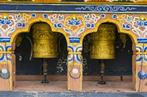 praying wheels in the Chimi Lhakhang monastery, Bhutan praying wheels in the Chimi Lhakhang monastery, Bhutan