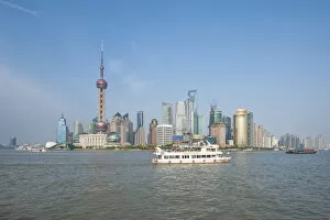 Images Dated 26th May 2012: Pudong district skyline and Huangpu River