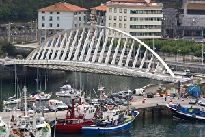 The Puerto Bridge crossing the harbor at Ondarroa, Basque Country, Northern Spain The Puerto Bridge crossing the harbor at Ondarroa, Basque Country, Northern Spain
