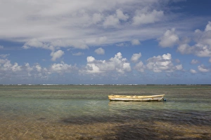 Puerto Rico, East Coast, Luquillo, Playa Luquillo Beach, seascape with small boat Puerto Rico, East Coast, Luquillo, Playa Luquillo Beach, seascape with small boat